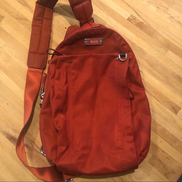tumi orange backpack